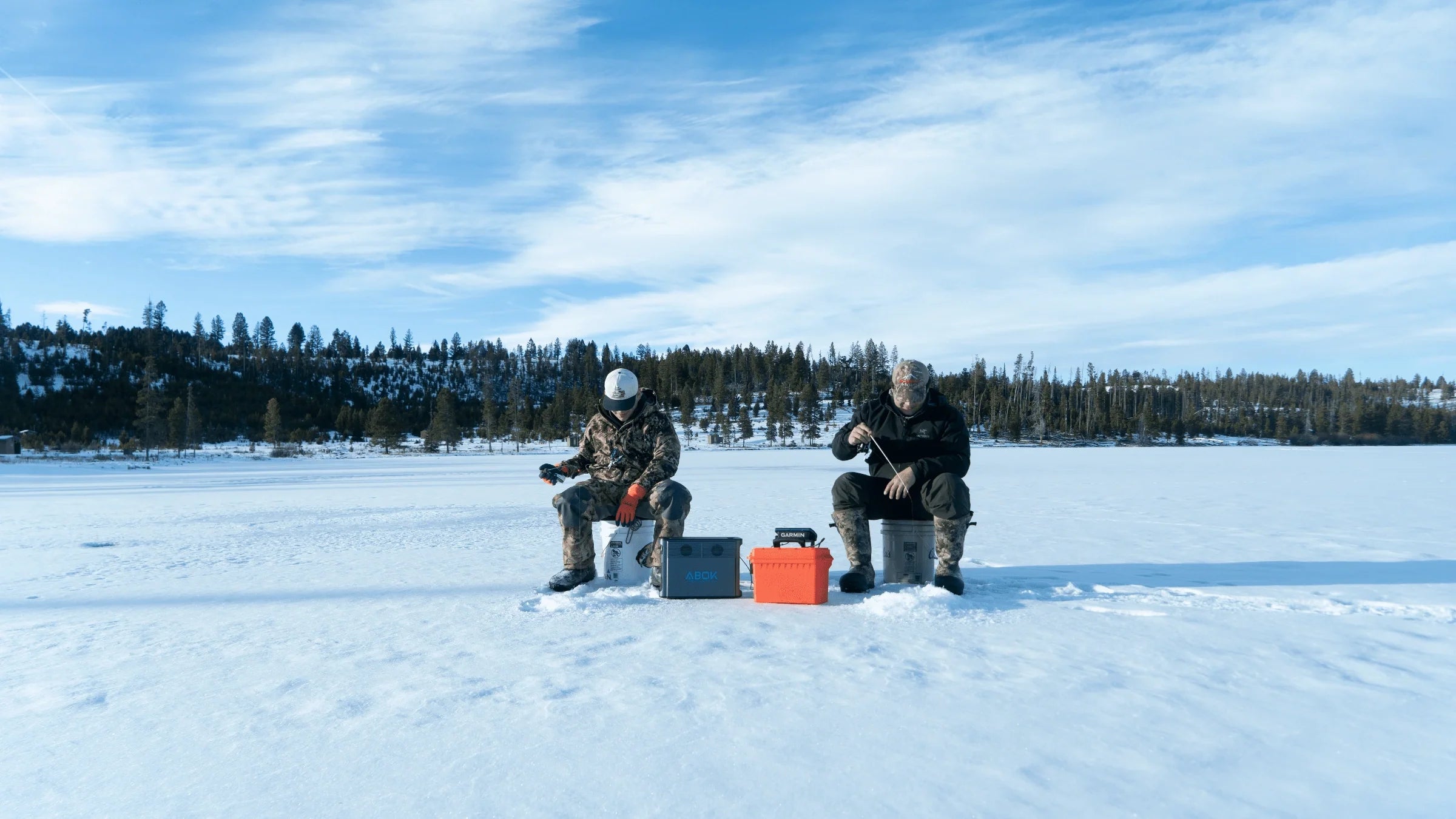 ABOK portable power stations supporting an ice fishing emergency campsite.