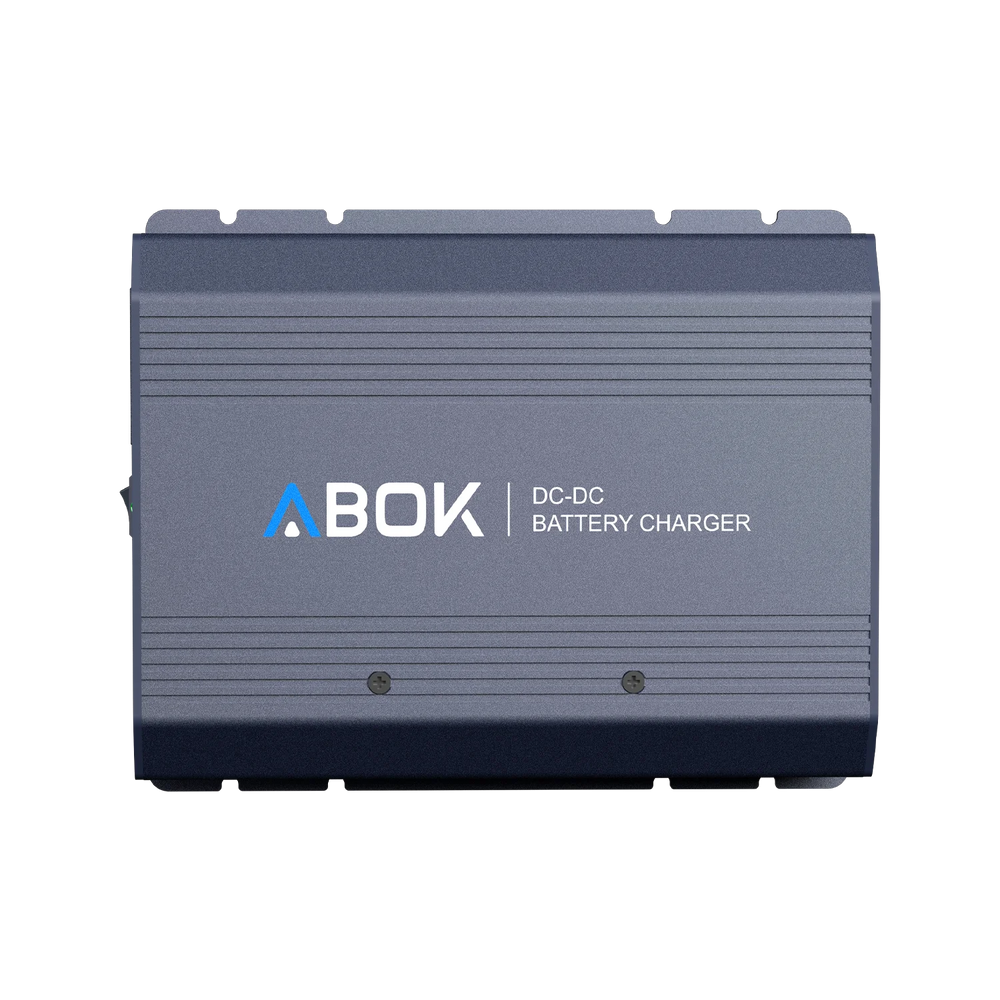 ABOK ACS500 DC-DC battery charger in a straight product view showing its ribbed aluminum housing and ABOK branding.