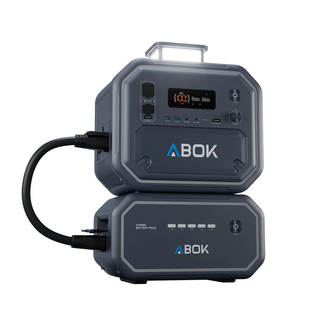 ABOK Ark2500 portable power station with its LED light raised and connected to a matching 2160Wh extra battery