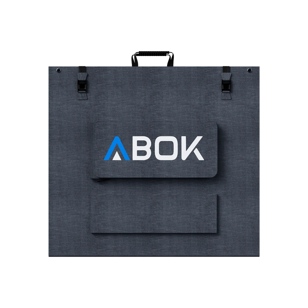 ABOK ASP200 foldable 200W solar panel shown closed from the rear with carry handle, buckles, and cable pouch.